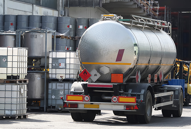 Industrial solvent containers and tanker truck